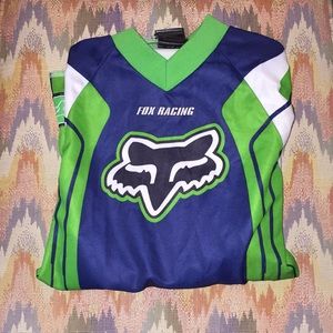 Fox racing shirt and black duffle bag